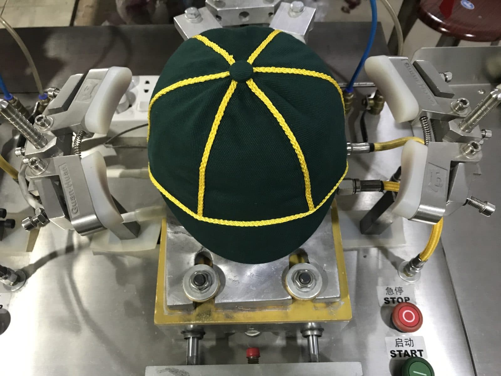 Steam shaping a finished cap